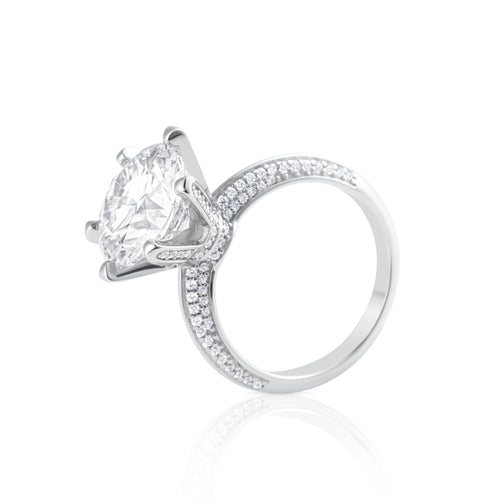 Side view of solitaire ring with 5 ct brilliant cut moissanite and pavé band in 925 sterling silver