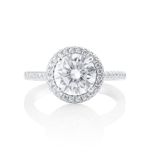 Front view of round halo moissanite ring with 2 ct brilliant cut center stone in 925 sterling silver