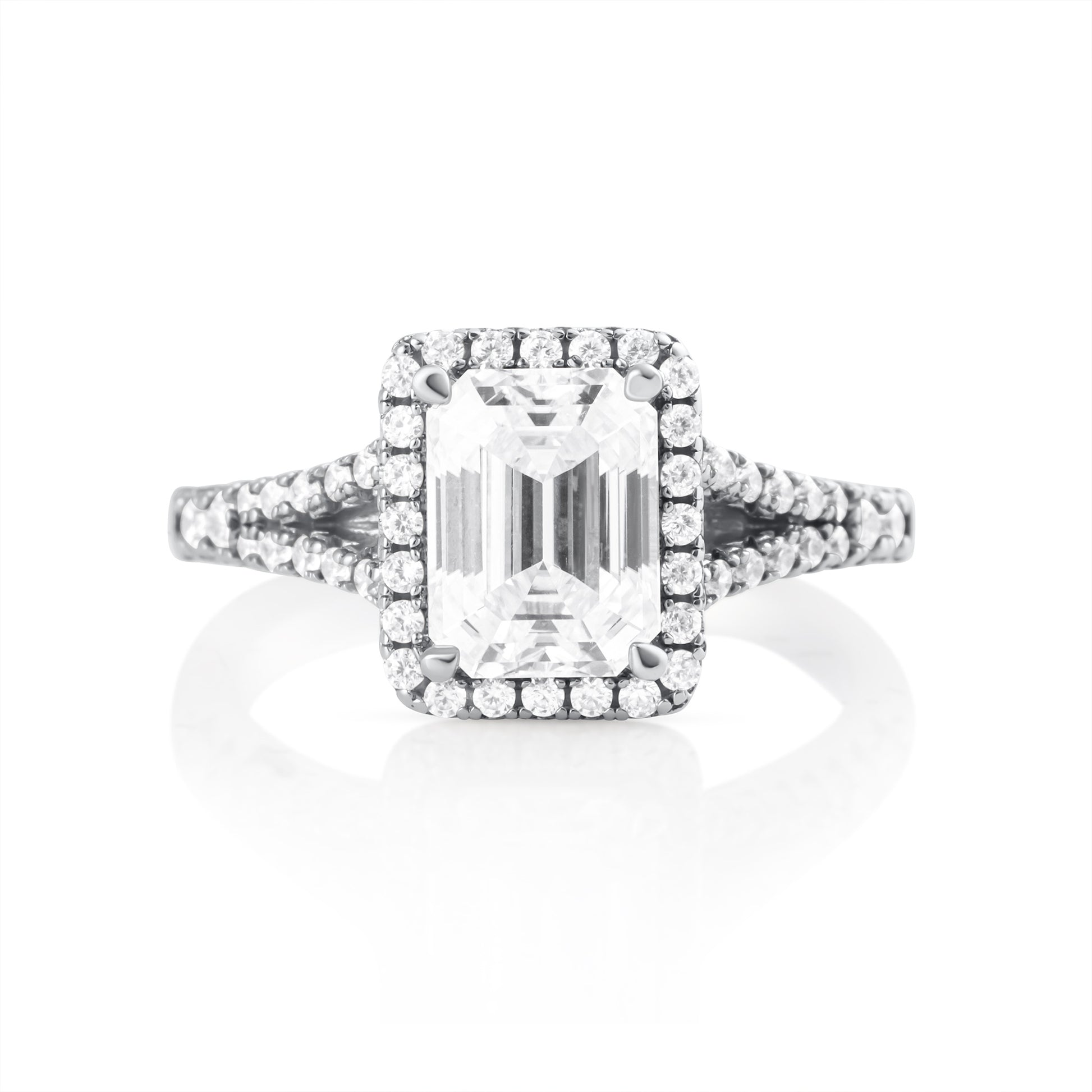 Front view of emerald cut moissanite ring with 2 ct center stone and halo setting in 925 sterling silver