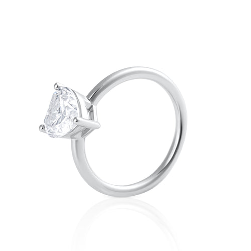 Side view of Cuore heart shaped emerald cut moissanite ring in platinum plated sterling silver