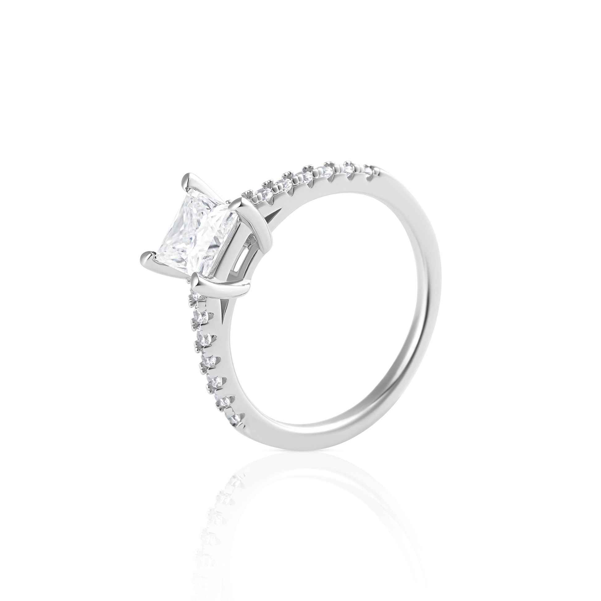 Princess cut moissanite ring with pavé side stones in platinum plated sterling silver side view