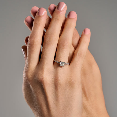 Princess cut 2 ct moissanite ring worn on hand in 925 sterling silver