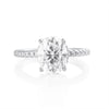 Oval cut 3ct moissanite ring in 925 sterling silver with pavé band detail front view