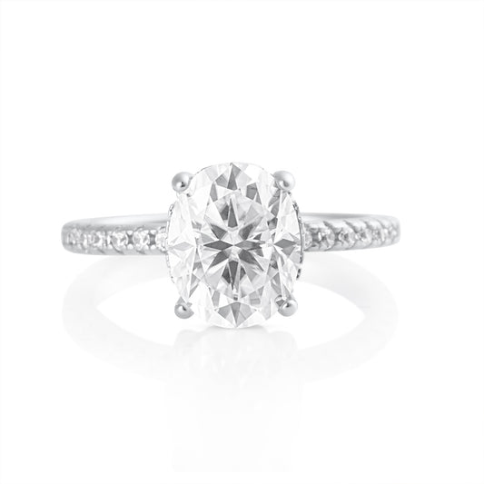 Oval cut 3ct moissanite ring in 925 sterling silver with pavé band detail front view