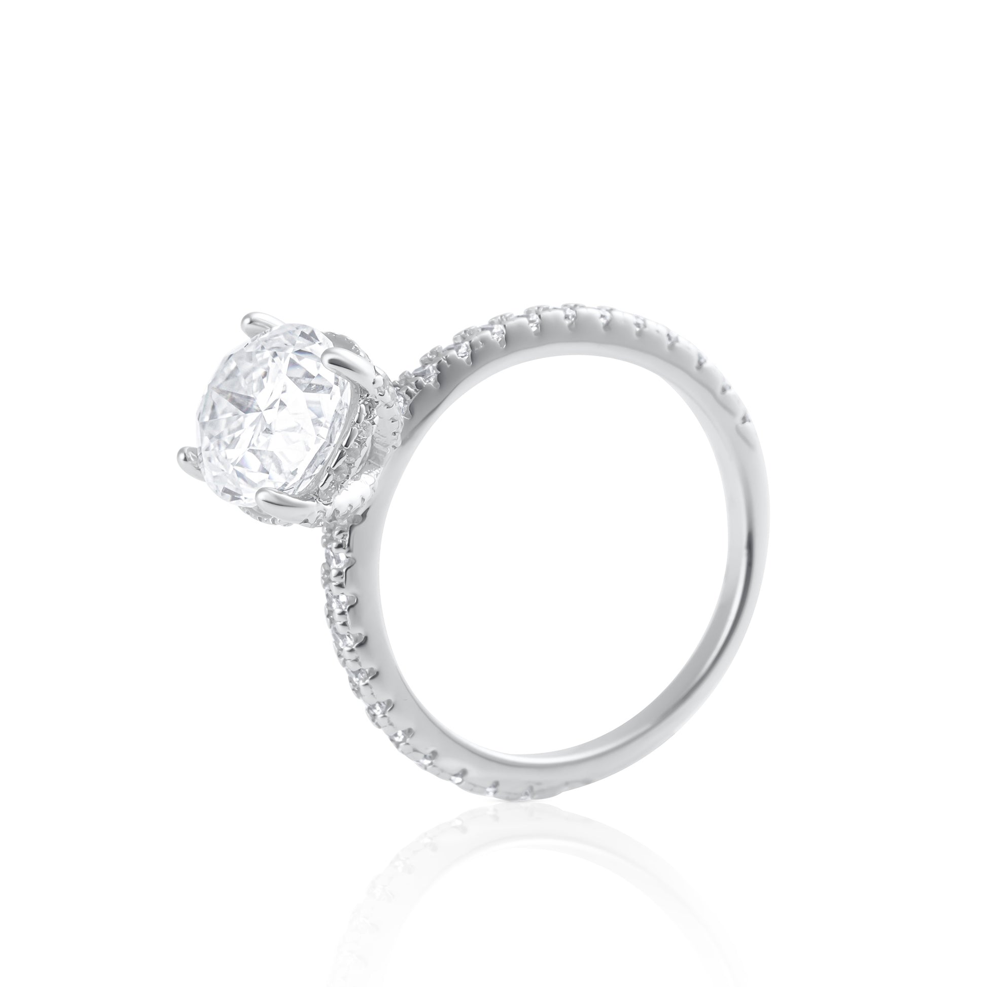 Side profile of oval cut 3ct moissanite ring in 925 sterling silver showing pavé setting