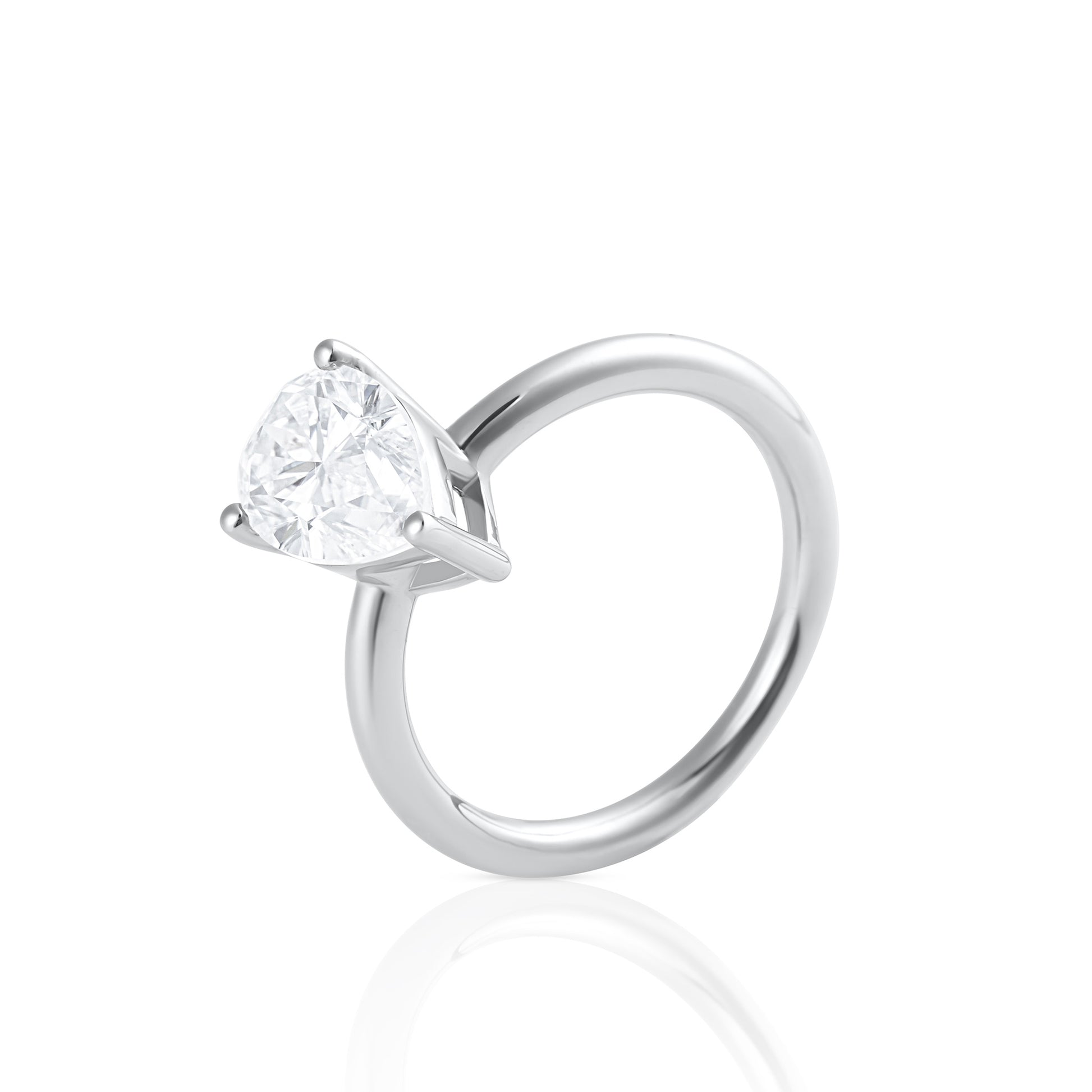 Side view of pear cut 3 ct moissanite ring in polished 925 sterling silver
