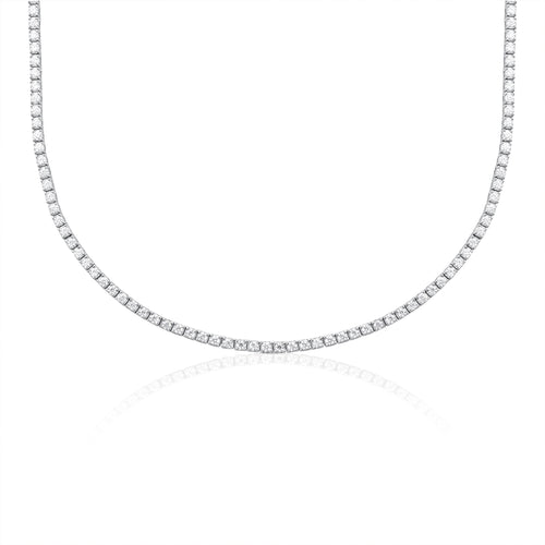 Luxury tennis necklace with brilliant cut moissanite stones in 925 sterling silver displayed on a white background with reflective surface.