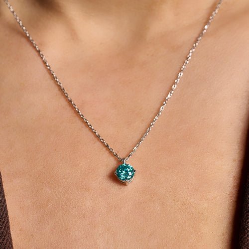 Summer Edition aquamarine light point necklace in 925 sterling silver with 1 ct moissanite worn on neck