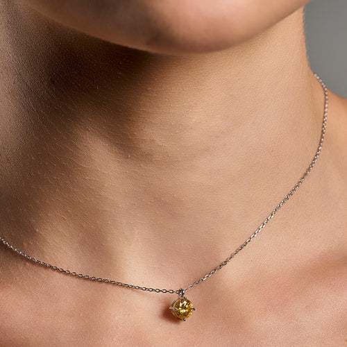 Summer Edition yellow light point necklace in 925 sterling silver with 1 ct moissanite worn on neck