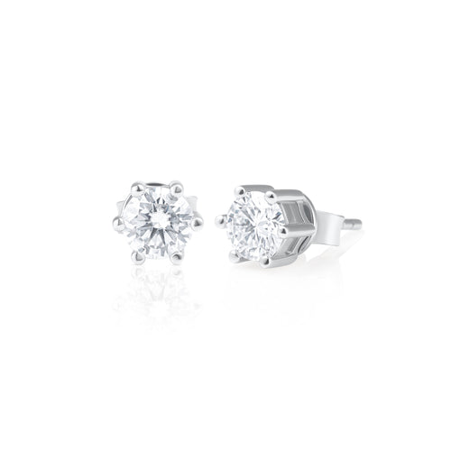 Pair of 0.5 ct brilliant cut moissanite stud earrings crafted in 925 sterling silver.