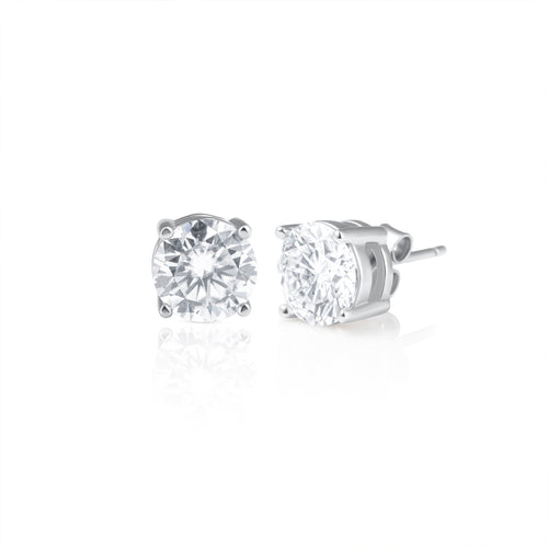 Pair of 1 ct brilliant cut moissanite stud earrings crafted in 925 sterling silver with a classic four-prong setting.