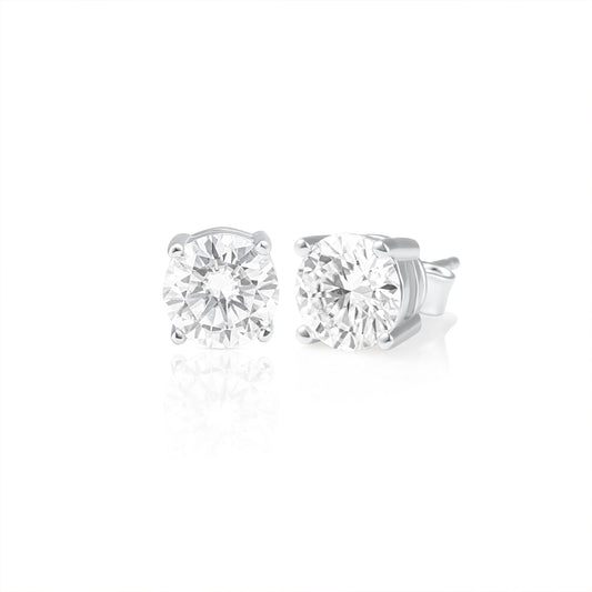 Pair of 2 ct brilliant cut moissanite stud earrings crafted in 925 sterling silver, showcasing exceptional sparkle and timeless elegance.