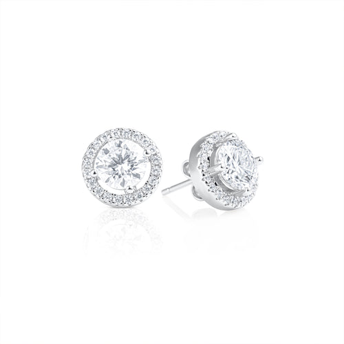 Round Contorno earrings featuring 1 ct brilliant cut moissanite stones in 925 sterling silver, displayed as a pair with a sparkling pavé halo design and polished finish.