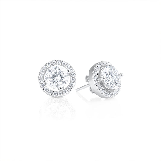 Round Contorno earrings featuring 1 ct brilliant cut moissanite stones in 925 sterling silver, displayed as a pair with a sparkling pavé halo design and polished finish.
