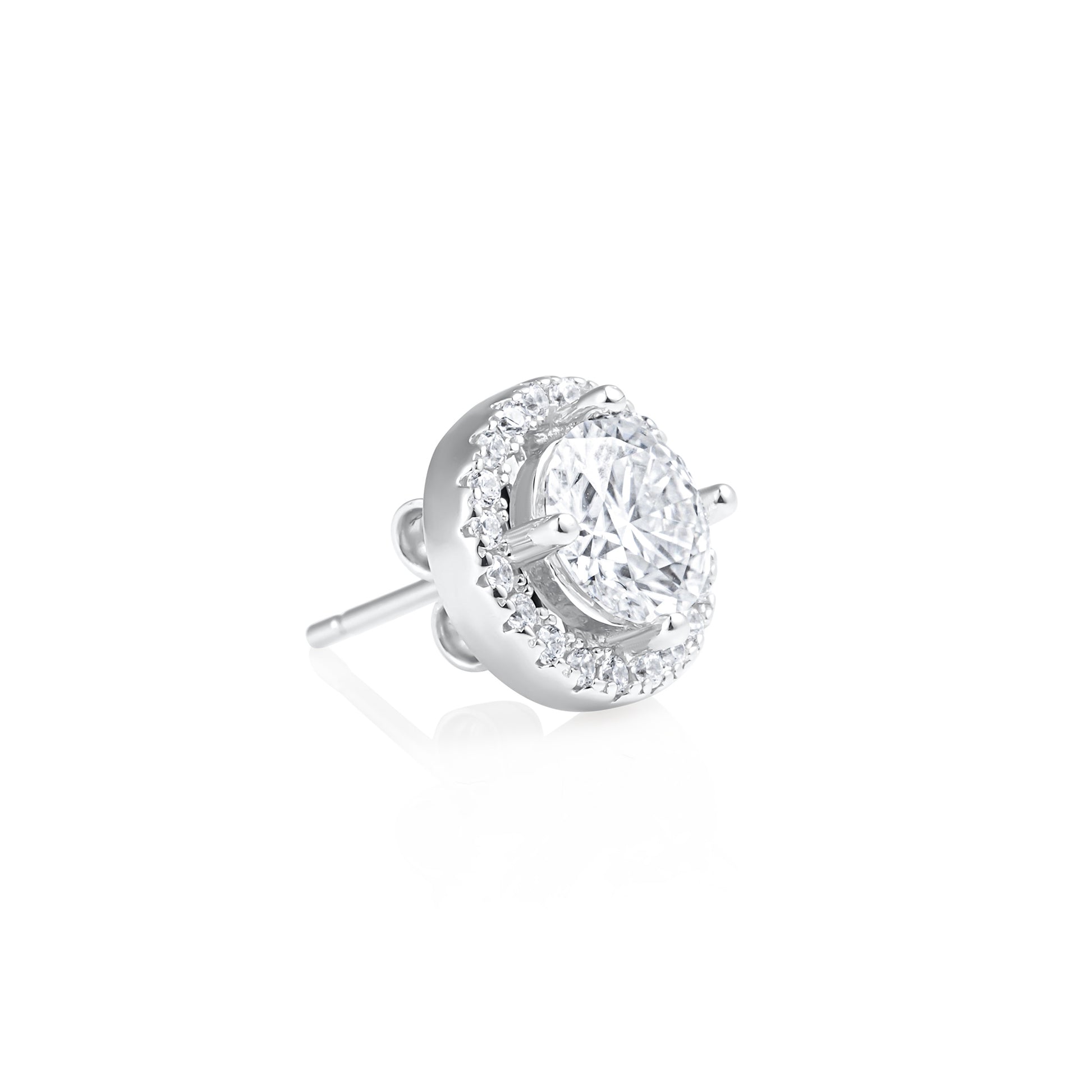 Angled side view of a Round Contorno earring featuring a 1 ct brilliant cut moissanite center stone with a pavé halo setting in 925 sterling silver.